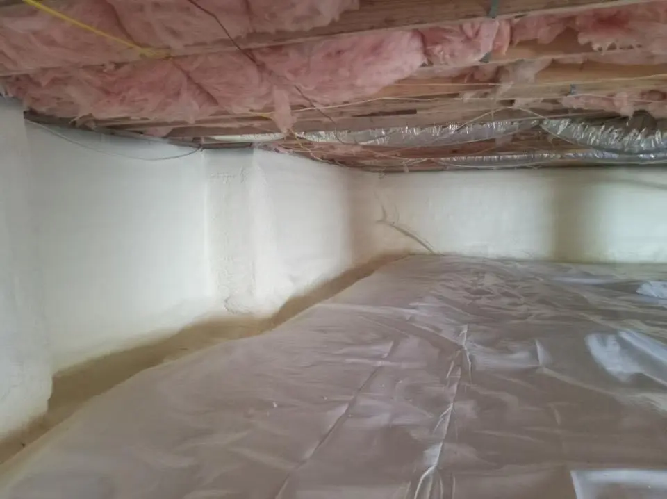 Crawl space encapsulation with closed-cell spray foam for Commercial Roof Restoration in Center